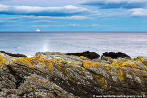 Moon rising after sunset at Portlethen, near Aberdeen, Scotland.