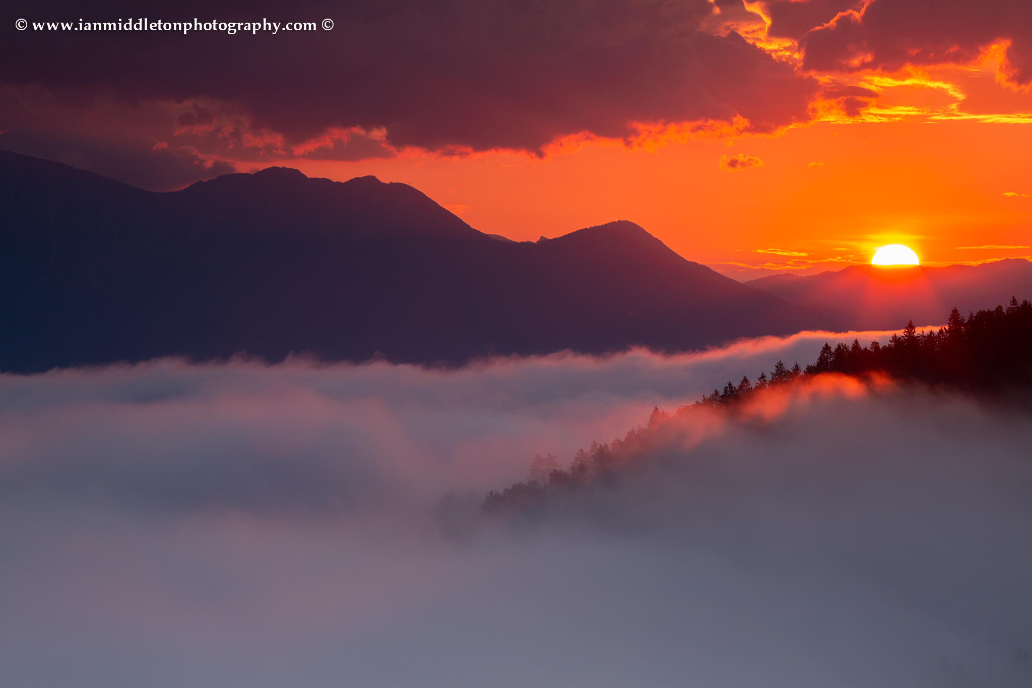 Sunrise over the Kamnik Alps, seen from Rantovše hill near Skofja Loka, Slovenia.