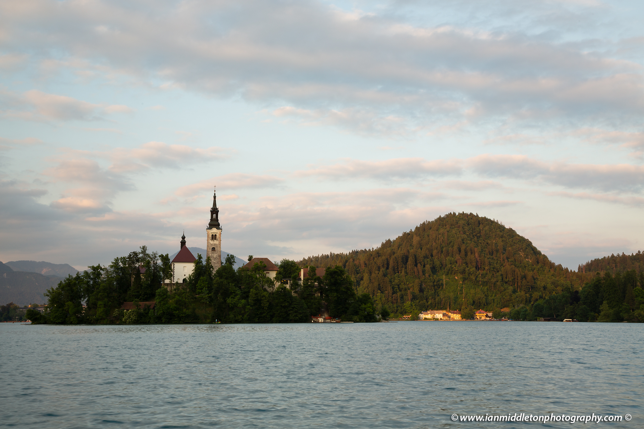 Sunset at Lake Bled's island church with the Karavank Mountains behind, Slovenia. - unedited version