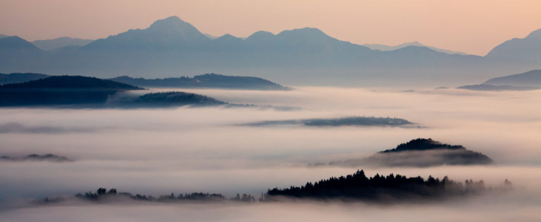 View across the Ljubljana Moors at sunrise to the Kamnik Alps. Ljubljana Marshland (Ljubljansko Barje), a large area of wetland 160 square kilometres in size.