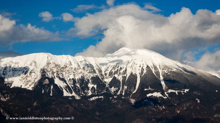 View across Lake Bled to Mt Stol, the highest peak in the Karavanke Alps. Seen from Mala Osojnica, Slovenia.