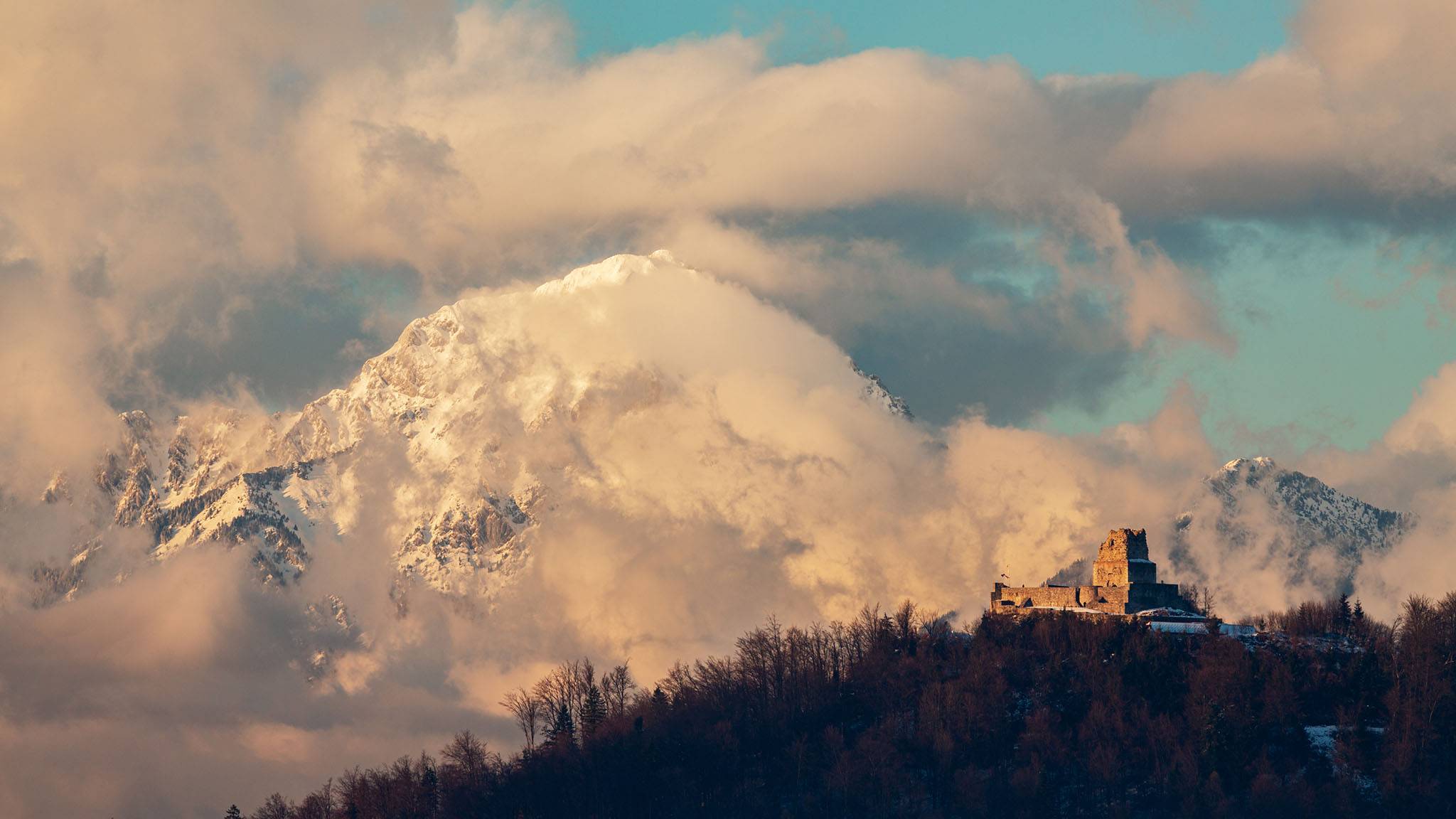 View of the ruins of Smlednik Castle with Storzic mountain, part of the Kamnik Alps, behind, Slovenia.