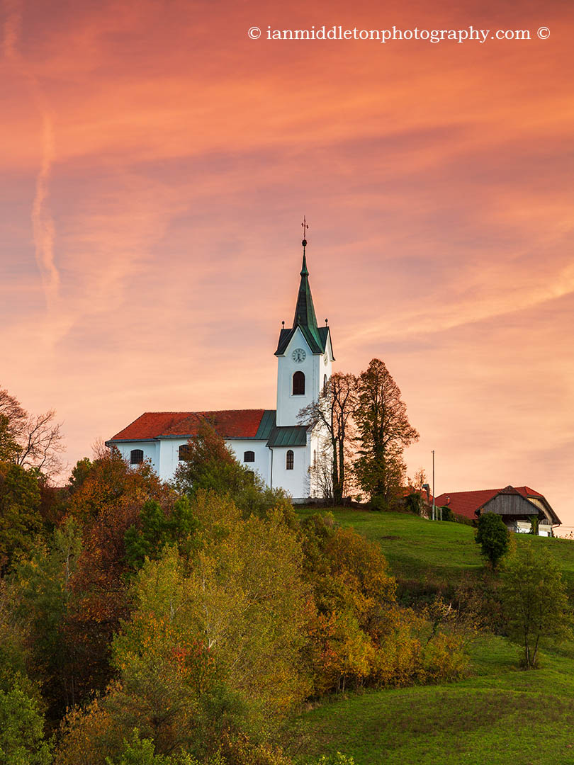 Sunset over the church of Saint Marjeta (Margaret) in Prezganje in the hills to the east of Ljubljana, Slovenia. - Why use an L bracket on a camera? - Three Legged Thing tutorial