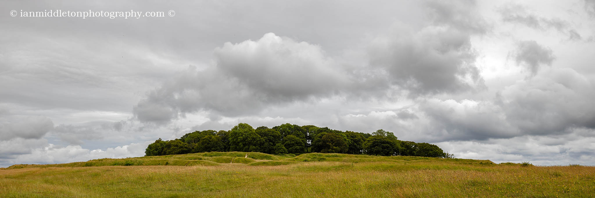 Badbury Rings in Dorset, a huge Iron Age hill fort that was actively in use up to and beyond the Roman occupation. Legend says that this is the location of King Arthur's last battle, where he was turned into a raven by witches. 