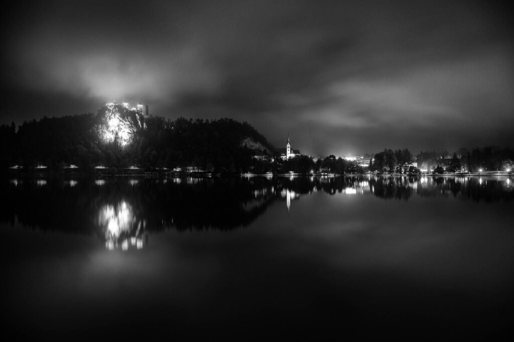 Lake Bled castle and church of Saint Martin at night, Slovenia.