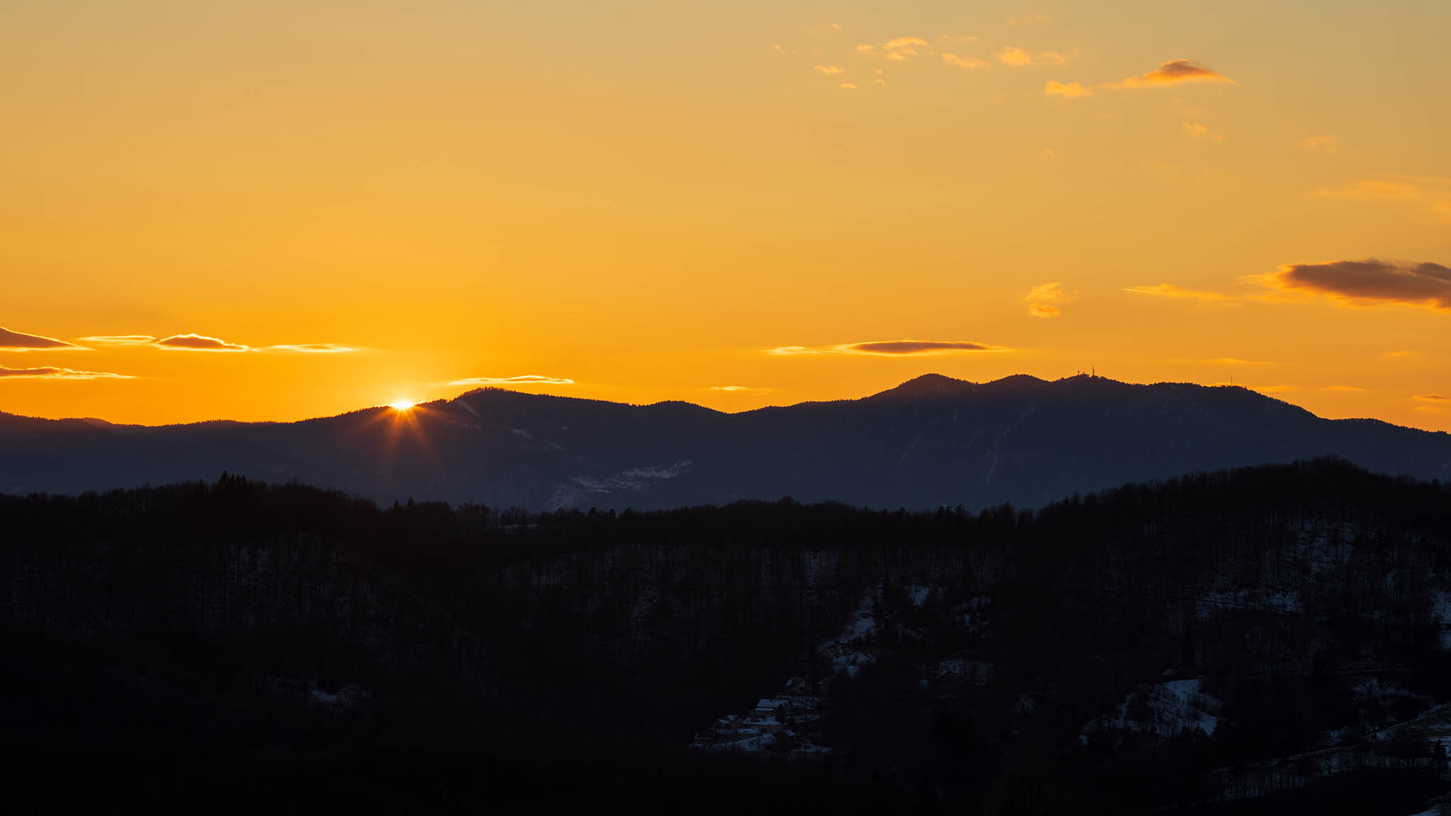 View across to Krim mountain at sunset, seen from a hill in prezganje in the Jance hills to the east of Ljubljana, Slovenia. From this region you get a fabulous view of the Slovenian Mountains.