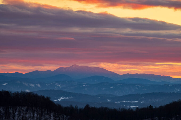 View across to Sneznik mountain at sunset