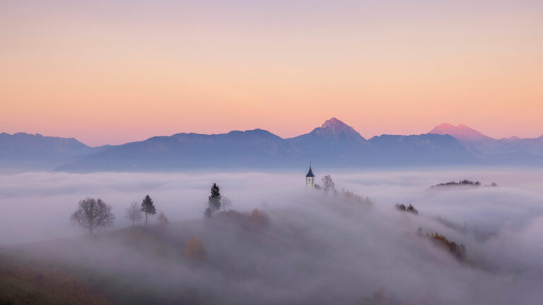 Jamnik Church and Kamnik Alps in Slovenia - Photo by Melvin Nicholson