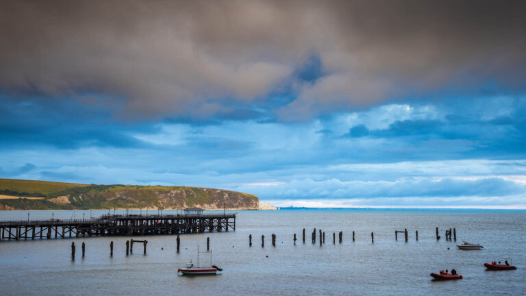 Swanage Old Pier with Old Harry in the distance