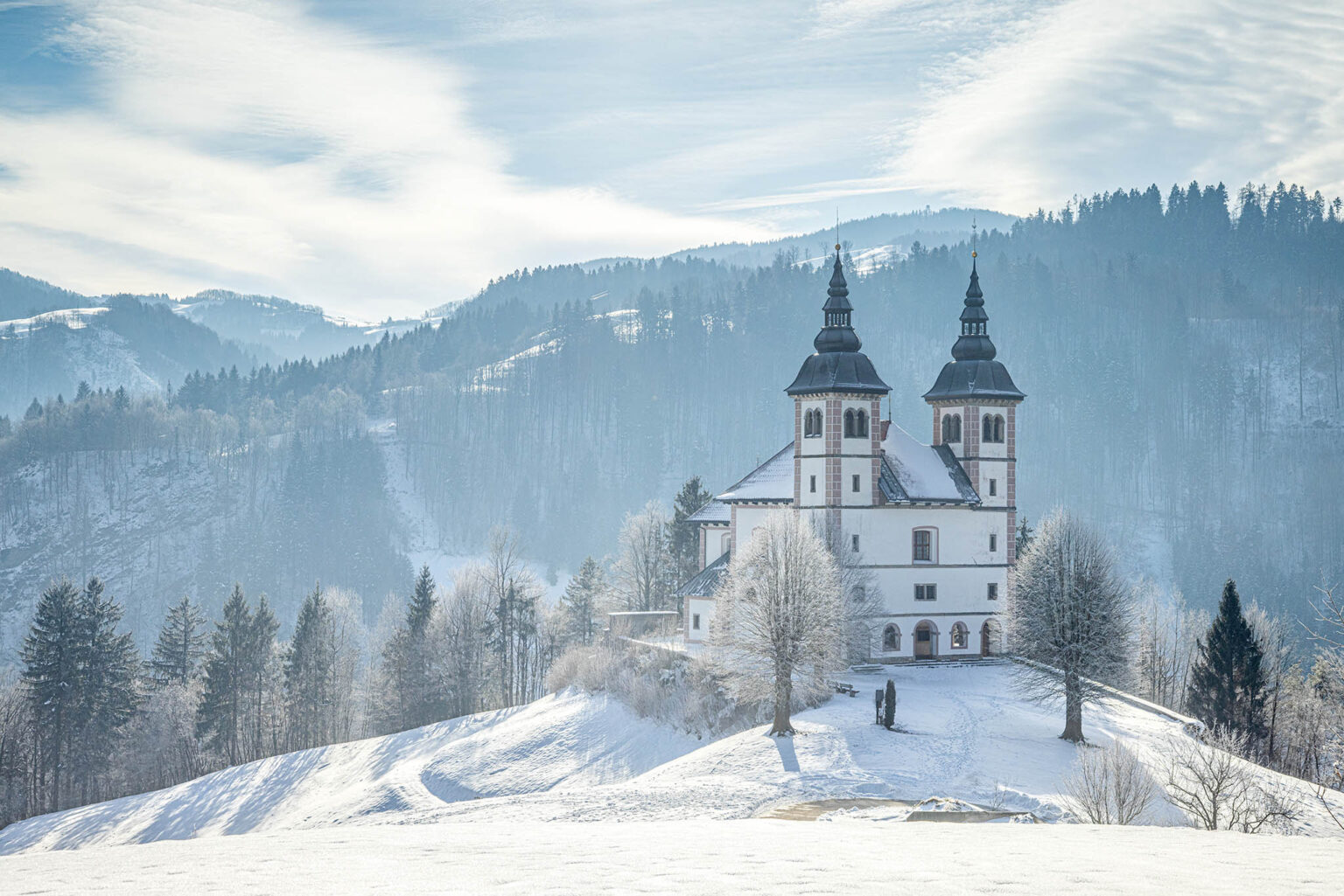 Saint Volbenk church in winter, Poljanska Sora, Slovenia.