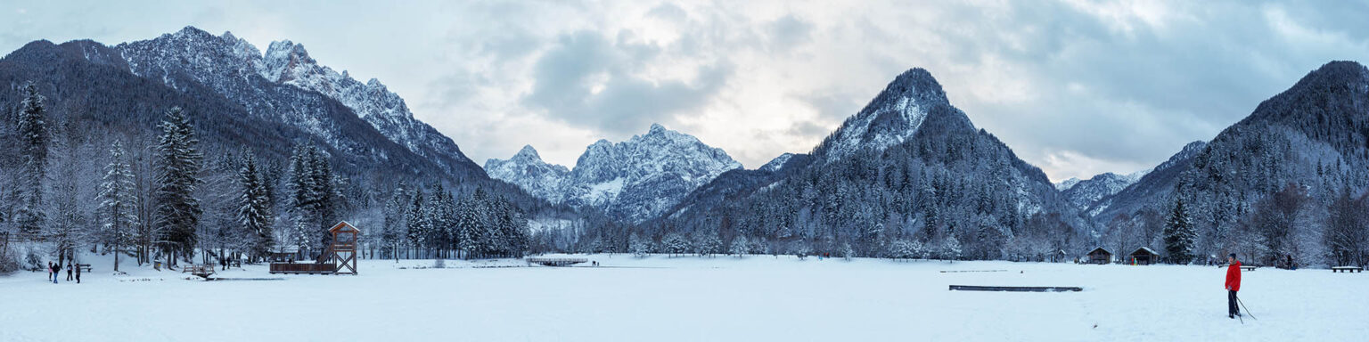 Stitched panorama of the Julian Alps seen across Lake Jasna in winter, near Kranjska Gora, Slovenia